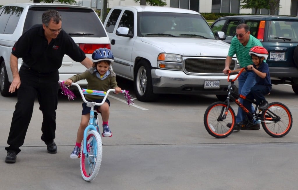 Kids Riding their Donated Bikes in Houston TX