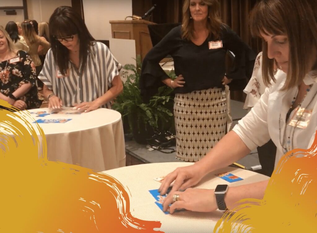 A group of employees is having fun during a fun game show activities.