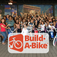 Build-A-Bike-Group-Having-Fun