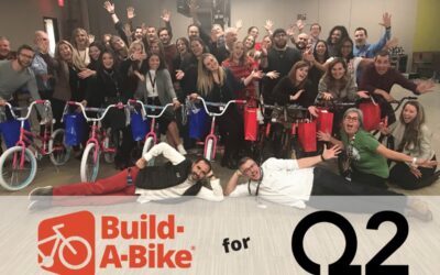 Q2 E-Bank Marketing Team Puts Creativity to the Test in Build-A-Bike Event for Austin Kids