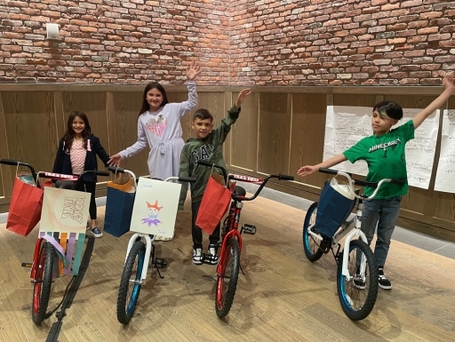 Lucky children who received a new bicycle at the Spinnaker Support Build-A-Bike® Event in Denver, CO