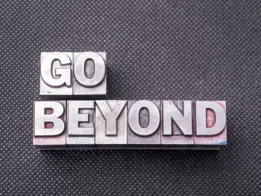 Photograph showing text "Go Beyond"