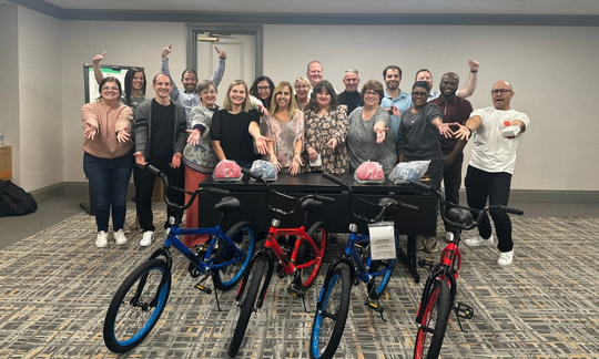 The pharmaceutical leader Mallinckrodt hosted a memorable Build-A-Bike® team building event in St. Louis, MO. This gathering, which included 30 attendees, served as an opportunity to reconnect and reward its team members. All in all, the event was not just a break from the routine. It was also a celebration of a spectacular year as acknowledged by the company's leadership. Mallinckrodt, a leader in specialty pharmaceuticals, plays a significant role in developing and distributing innovative treatments for underserved patient populations. With a focus on various specialties like neurology, rheumatology, and oncology, their work extends to immunotherapy, neonatal respiratory critical care therapies, and more. They also specialize in acute and critical care hospital products, generic prescription medicines, and active pharmaceutical ingredients. Their dedication to quality, integrity, and service, principles instilled over a century ago, continues to shape the future of the specialty pharmaceuticals industry. Mallinckrodt employees come together for Build-A-Bike® event in St. Louis, Missouri The event unfolded over two days filled with team-building activities and work sessions. Initially, attendees were a bit reserved, but as the event progressed, they began to break out of their shells, enhancing their camaraderie and collaboration skills. The Build-A-Bike® event was a perfect mix of fun and purpose, aligning with Mallinckrodt's values of teamwork and service. In a setting that encouraged interaction and engagement, the team members strengthened their connections, crucial for a company with a diverse and dynamic workforce. During the event, the teams engaged in a friendly competition to assemble bicycles. This exercise was not just about building bikes but also about building relationships and fostering a sense of team spirit. The reward for their efforts was more than just the satisfaction of a job well done. Each participant received a pair of brand new AirPod Pros, a gesture that underlined the company's appreciation for their hard work and dedication. We extend our heartfelt thanks to Mallinckrodt for their generous contribution to Variety, a children's charity. This event not only strengthened the team's bond but also made a significant impact on the community. The effort put forth by Mallinckrodt's team in assembling and donating bicycles will bring joy and mobility to many children, reflecting the company's commitment to service and community welfare. Looking to strengthen team bonds while making a positive impact? Join us for an engaging Build-A-Bike® team building event in St. Lous, Missouri!