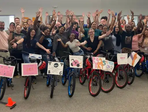 Smith+Nephew Manufacturing Team Builds Bikes and Bonds at Charity Event in Columbia, MD
