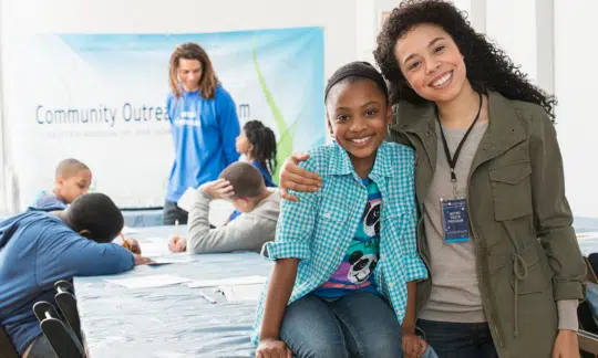 Corporate team combining soft skills training with charity events